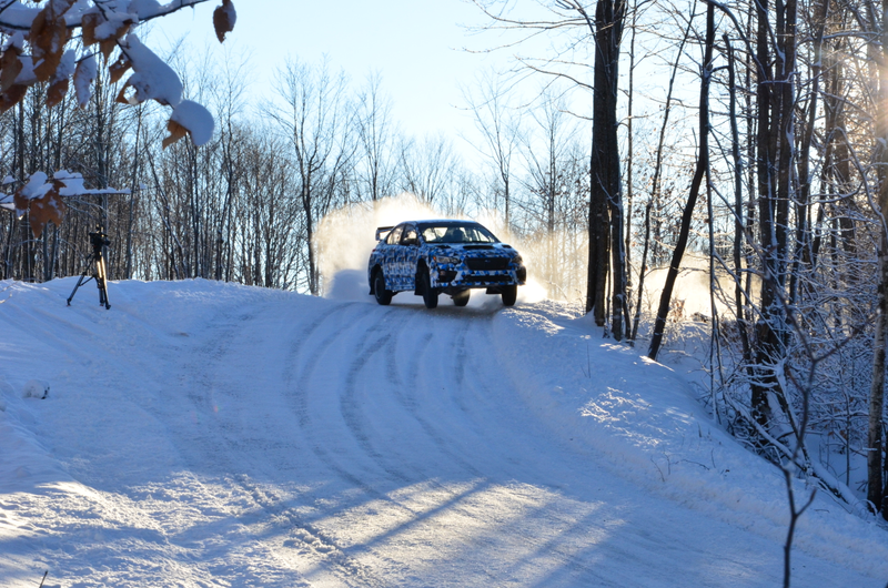 Illustration for article titled Watch The 2015 Subaru WRX STI Rally Car Catch Air Sideways